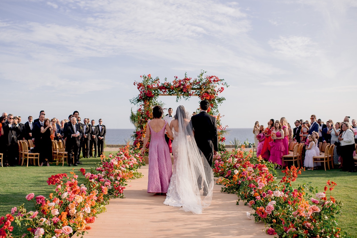 Floral ceremony aisle and arch